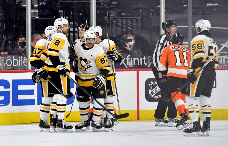 May 4, 2021; Philadelphia, Pennsylvania, USA;  Pittsburgh Penguins center Sidney Crosby (87) celebrates his goal with teammates against the Philadelphia Flyers during the third period at Wells Fargo Center. Mandatory Credit: Eric Hartline-USA TODAY Sports