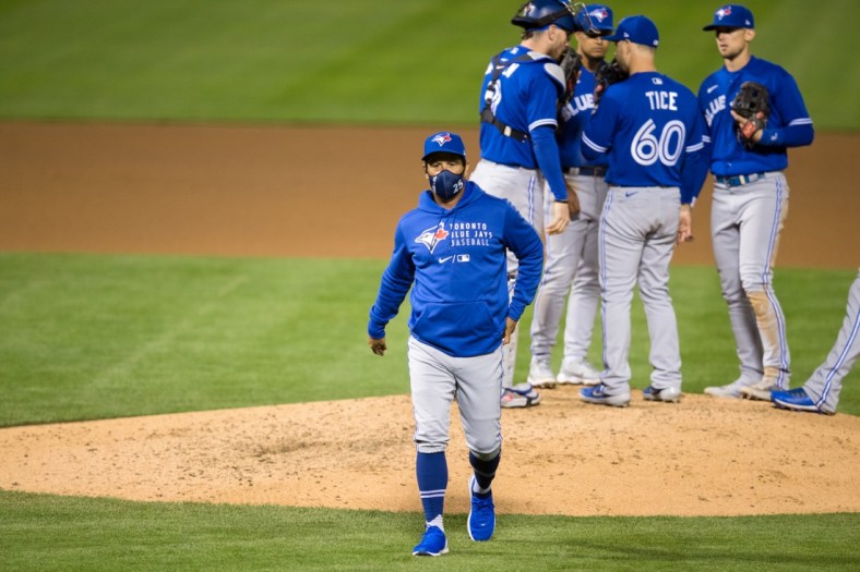 May 4, 2021; Oakland, California, USA; Toronto Blue Jays manager Charlie Montoyo leaves the field after swapping pitchers in the seventh inning of the game against the Oakland Athletics at RingCentral Coliseum. Mandatory Credit: John Hefti-USA TODAY Sports