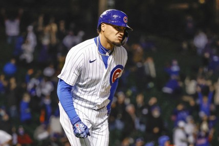 May 4, 2021; Chicago, Illinois, USA; Chicago Cubs shortstop Javier Baez (9) reacts after hitting a two-run home run against the Los Angeles Dodgers during the eight inning of the second game of a doubleheader at Wrigley Field. Mandatory Credit: Kamil Krzaczynski-USA TODAY Sports
