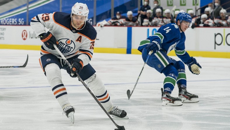 May 4, 2021; Vancouver, British Columbia, CAN; Edmonton Oilers forward Leon Draisaitl (29) skates against the Vancouver Canucks  in the second period at Rogers Arena. Mandatory Credit: Bob Frid-USA TODAY Sports