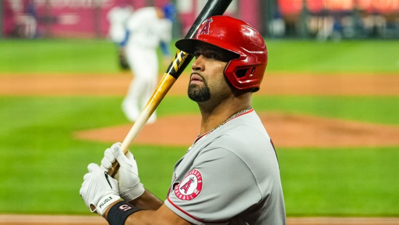 Apr 12, 2021; Kansas City, Missouri, USA; Los Angeles Angels first baseman Albert Pujols (5) gets ready to bat against the Kansas City Royals during the sixth inning at Kauffman Stadium. Mandatory Credit: Jay Biggerstaff-USA TODAY Sports