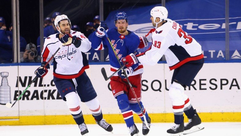 May 5, 2021; New York, New York, USA;  Pavel Buchnevich #89 of the New York Rangers skates against Tom Wilson #43 and Zdeno Chara #33 of the Washington Capitals during the first period at Madison Square Garden. Mandatory Credit:  Bruce Bennett/POOL PHOTOS-USA TODAY Sports