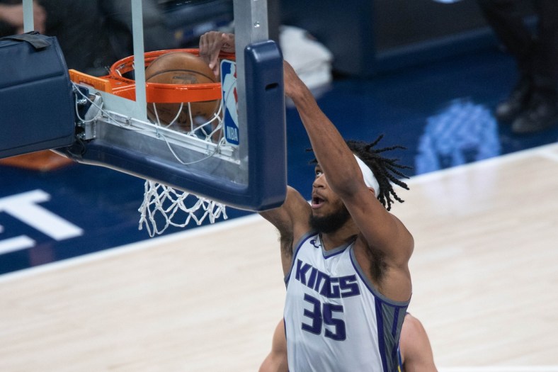 May 5, 2021; Indianapolis, Indiana, USA; Sacramento Kings forward Marvin Bagley III (35) dunks the ball in the third quarter against the Indiana Pacers at Bankers Life Fieldhouse. Mandatory Credit: Trevor Ruszkowski-USA TODAY Sports