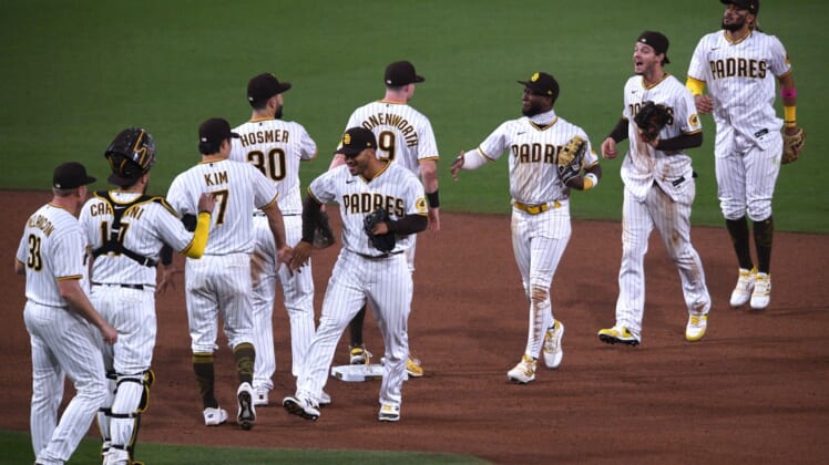 May 5, 2021; San Diego, California, USA; San Diego Padres players celebrate on the field after defeating the Pittsburgh Pirates at Petco Park. Mandatory Credit: Orlando Ramirez-USA TODAY Sports