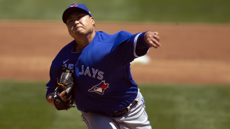 May 6, 2021; Oakland, California, USA; Toronto Blue Jays starting pitcher Hyun Jin Ryu (99) delivers a pitch against the Oakland Athletics during the second inning at RingCentral Coliseum. Mandatory Credit: D. Ross Cameron-USA TODAY Sports