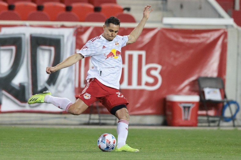 Apr 17, 2021; Harrison, New Jersey, USA;  New York Red Bulls midfielder Aaron Long (33) plays the ball against the Sporting Kansas City during the first half at Red Bull Arena. Mandatory Credit: Vincent Carchietta-USA TODAY Sports