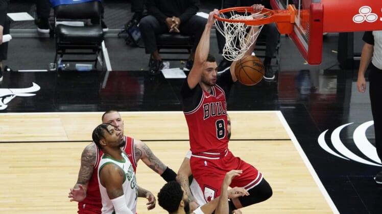 May 7, 2021; Chicago, Illinois, USA; Chicago Bulls guard Zach LaVine (8) dunks the ball against the Boston Celtics during the second half at United Center. Mandatory Credit: David Banks-USA TODAY Sports