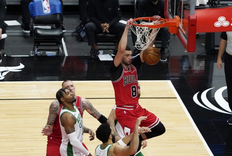 May 7, 2021; Chicago, Illinois, USA; Chicago Bulls guard Zach LaVine (8) dunks the ball against the Boston Celtics during the second half at United Center. Mandatory Credit: David Banks-USA TODAY Sports