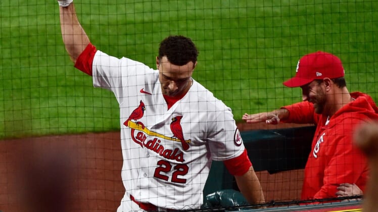 May 7, 2021; St. Louis, Missouri, USA;  St. Louis Cardinals starting pitcher Jack Flaherty (22) salutes the fans as he receives a curtain call after hitting a solo home run off of Colorado Rockies starting pitcher Austin Gomber (not pictured) during the third inning at Busch Stadium. Mandatory Credit: Jeff Curry-USA TODAY Sports
