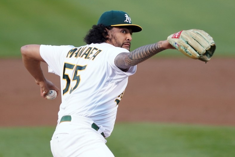 May 7, 2021; Oakland, California, USA; Oakland Athletics starting pitcher Sean Manaea (55) throws a pitch during the third inning against the Tampa Bay Rays at RingCentral Coliseum. Mandatory Credit: Darren Yamashita-USA TODAY Sports
