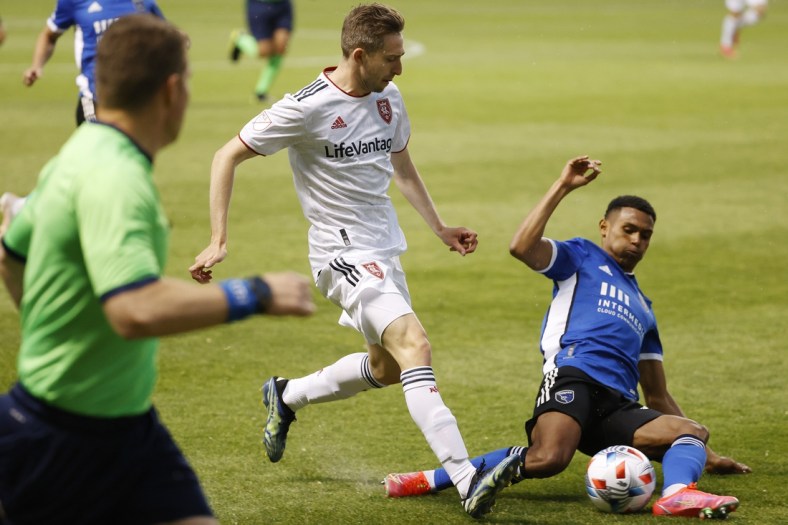 May 7, 2021; Sandy, Utah, USA; Real Salt Lake defender Andrew Brody (2) and San Jose Earthquakes defender Marcos Lopez (27) battle in the first half at Rio Tinto Stadium. Mandatory Credit: Jeffrey Swinger-USA TODAY Sports