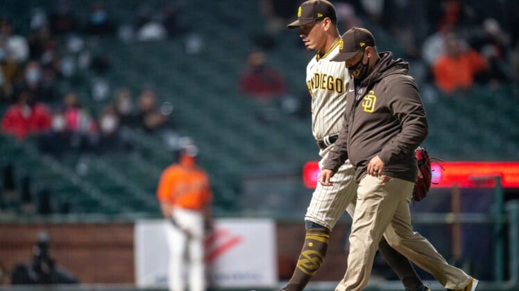 May 7, 2021; San Francisco, California, USA; San Diego Padres relief pitcher Keone Kela (27) is relieved due to injury during the seventh inning against the San Francisco Giants at Oracle Park. Mandatory Credit: Neville E. Guard-USA TODAY Sports