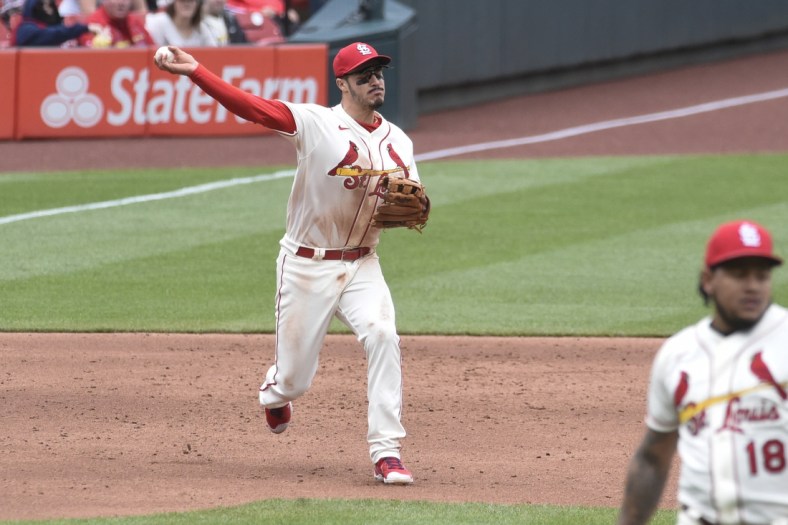 May 8, 2021; St. Louis, Missouri, USA; St. Louis Cardinals third baseman Nolan Arenado (28) throws to first for an out against the Colorado Rockies in the third inning at Busch Stadium. Mandatory Credit: Joe Puetz-USA TODAY Sports