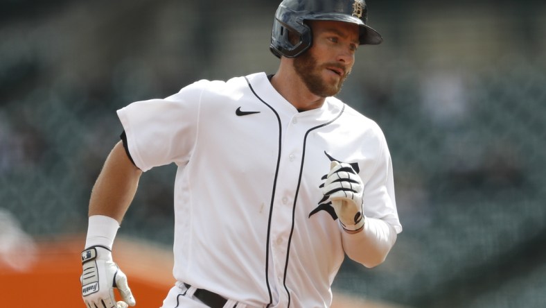 May 8, 2021; Detroit, Michigan, USA; Detroit Tigers left fielder Robbie Grossman (8) rounds the bases after hitting a solo home run during the first inning against the Minnesota Twins at Comerica Park. Mandatory Credit: Raj Mehta-USA TODAY Sports