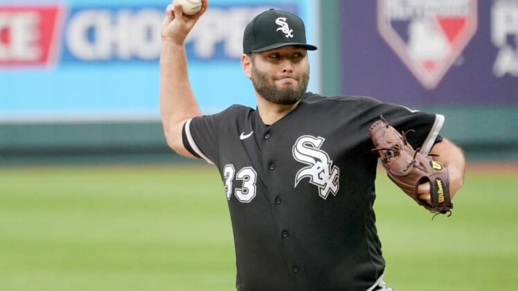May 8, 2021; Kansas City, Missouri, USA; Chicago White Sox starting pitcher Lance Lynn (33) delivers a pitch in the first inning against the Kansas City Royals at Kauffman Stadium. Mandatory Credit: Denny Medley-USA TODAY Sports