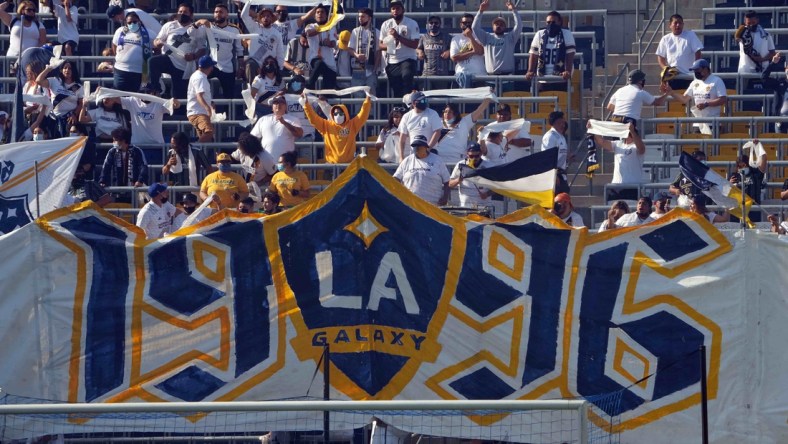 May 8, 2021; Carson, California, USA;  LA Galaxy fans hold a tifo in the first half against the LAFC at Dignity Health Sports Park. Mandatory Credit: Kirby Lee-USA TODAY Sports