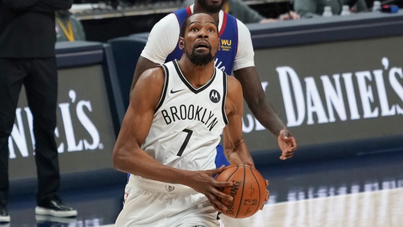 May 8, 2021; Denver, Colorado, USA; Brooklyn Nets forward Kevin Durant (7) drives to the basket against the Denver Nuggets during the fourth quarter at Ball Arena. Mandatory Credit: Troy Babbitt-USA TODAY Sports