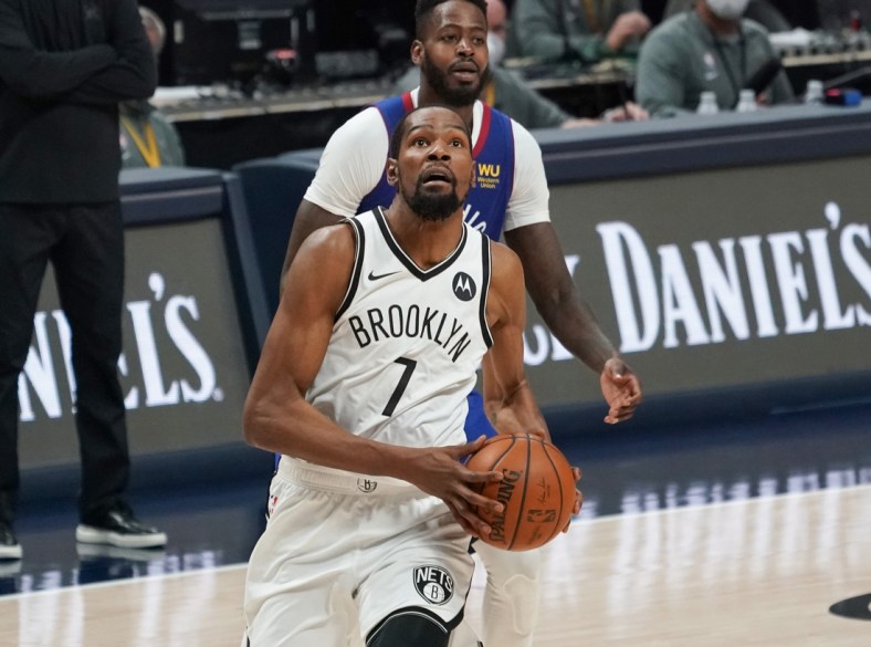 May 8, 2021; Denver, Colorado, USA; Brooklyn Nets forward Kevin Durant (7) drives to the basket against the Denver Nuggets during the fourth quarter at Ball Arena. Mandatory Credit: Troy Babbitt-USA TODAY Sports
