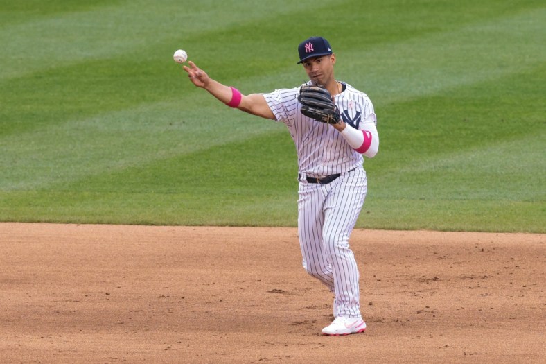 May 9, 2021; Bronx, New York, USA; New York Yankees shortstop Gleyber Torres (25) throws the ball to first base for an out during the seventh inning against the Washington Nationals at Yankee Stadium. Mandatory Credit: Vincent Carchietta-USA TODAY Sports