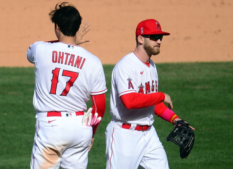 May 9, 2021; Anaheim, California, USA; Los Angeles Angels first baseman Jared Walsh (20) and designated hitter Shohei Ohtani (17) celebrate the 2-1 victory against the Los Angeles Dodgers at Angel Stadium. Mandatory Credit: Gary A. Vasquez-USA TODAY Sports