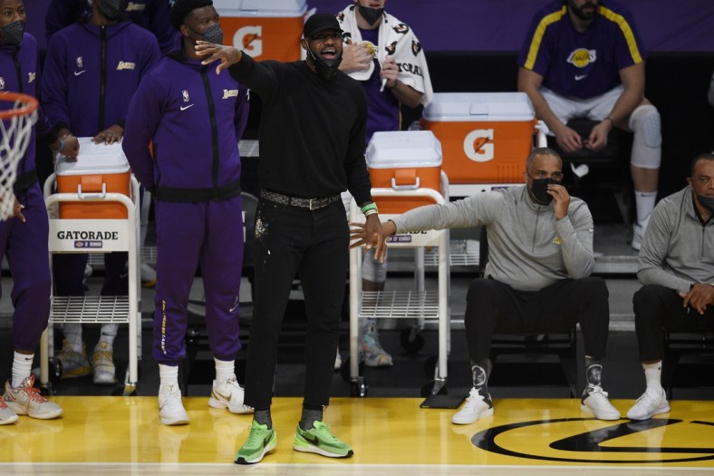 May 9, 2021; Los Angeles, California, USA; Los Angeles Lakers forward LeBron James (23) yells from the sidelines during the second half against the Phoenix Suns at Staples Center. Mandatory Credit: Kelvin Kuo-USA TODAY Sports