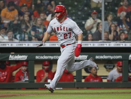 May 10, 2021; Houston, Texas, USA; Los Angeles Angels center fielder Mike Trout (27) runs towards home plate to score a run during the fourth inning against the Houston Astros at Minute Maid Park. Mandatory Credit: Troy Taormina-USA TODAY Sports