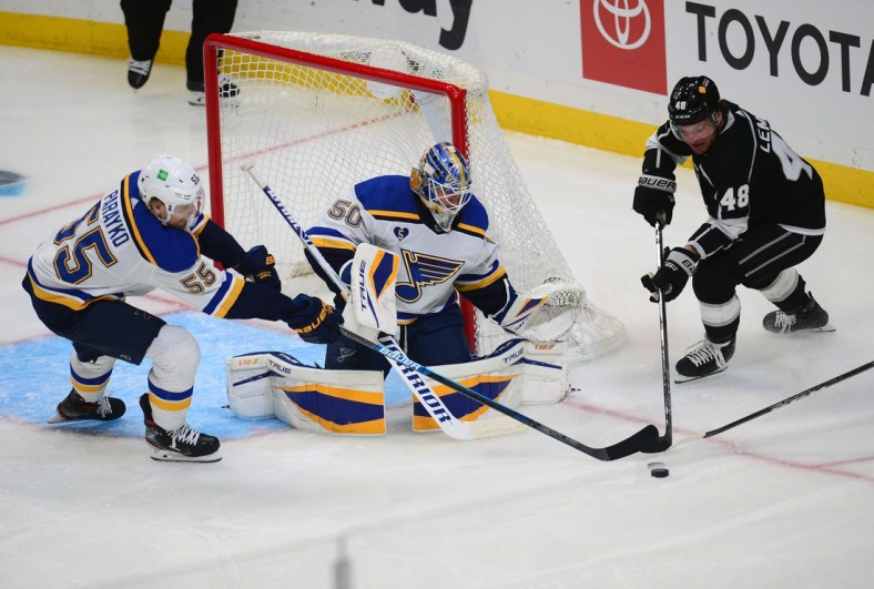 May 10, 2021; Los Angeles, California, USA; Los Angeles Kings left wing Brendan Lemieux (48) moves in for a shot as St. Louis Blues defenseman Colton Parayko (55) helps goaltender Jordan Binnington (50) defend the goal during the second period at Staples Center. Mandatory Credit: Gary A. Vasquez-USA TODAY Sports