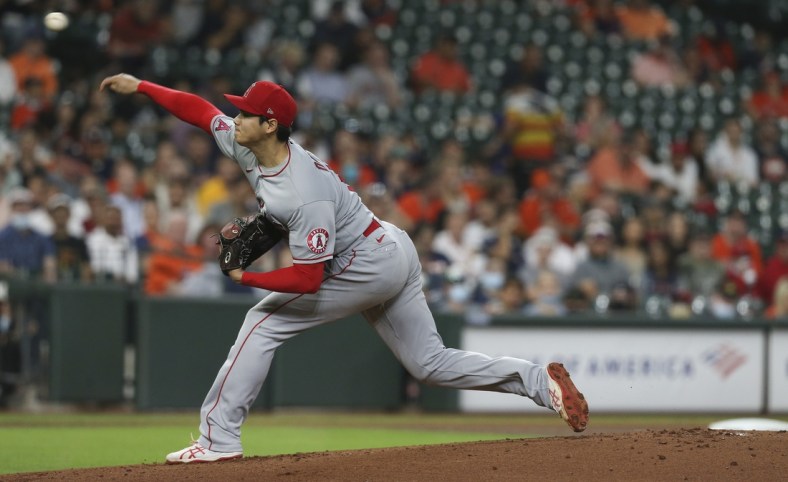 May 11, 2021; Houston, Texas, USA; Los Angeles Angels designated hitter Shohei Ohtani (17) pitches against the Houston Astros in the first inning at Minute Maid Park. Mandatory Credit: Thomas Shea-USA TODAY Sports