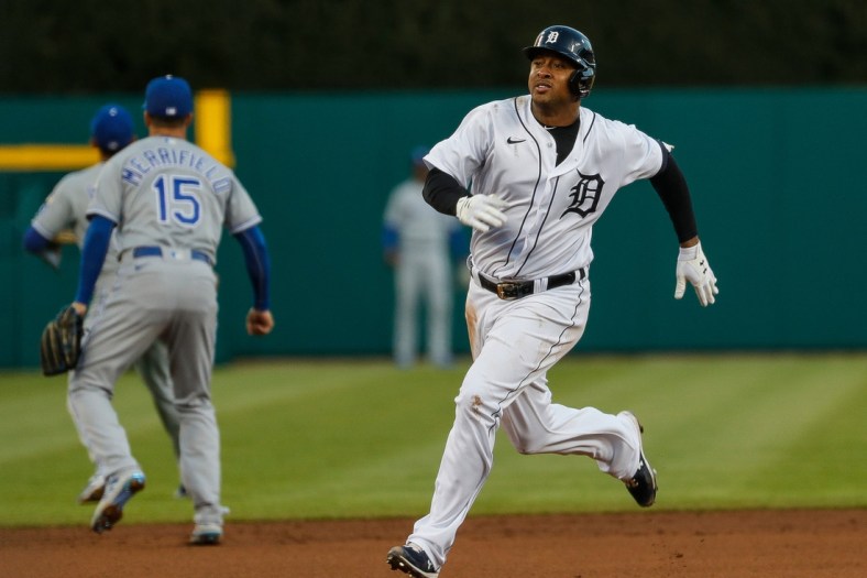 Detroit Tigers second baseman Jonathan Schoop (7) runs towards third base after batting a triple against Kansas City Royals during third inning at Comerica Park in Detroit on Tuesday, May 11, 2021.
