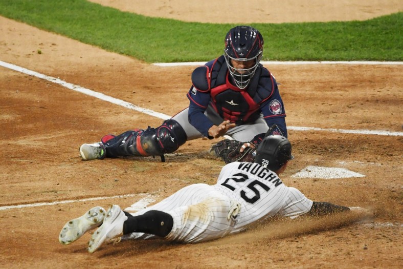 May 11, 2021; Chicago, Illinois, USA; Minnesota Twins catcher Ben Rortvedt (70) tags out Chicago White Sox first baseman Andrew Vaughn (25) at home plate in the second inning at Guaranteed Rate Field. Mandatory Credit: Quinn Harris-USA TODAY Sports