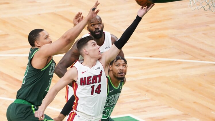 May 11, 2021; Boston, Massachusetts, USA; Miami Heat guard Tyler Herro (14) drives to the basket against the Boston Celtics in the first quarter at TD Garden. Mandatory Credit: David Butler II-USA TODAY Sports