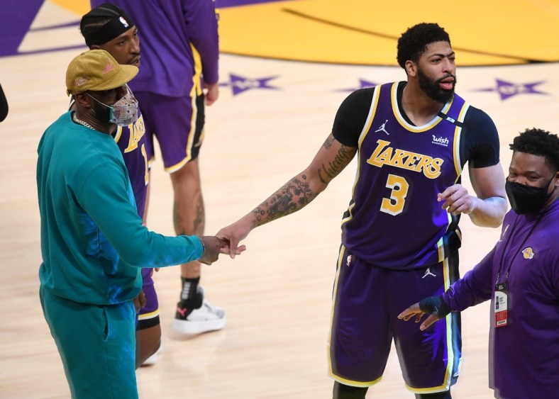 May 11, 2021; Los Angeles, California, USA; Los Angeles Lakers forward LeBron James (L) celebrates with forward Anthony Davis (3) after defeating the New York Knicks in overtime at Staples Center. Mandatory Credit: Jayne Kamin-Oncea-USA TODAY Sports