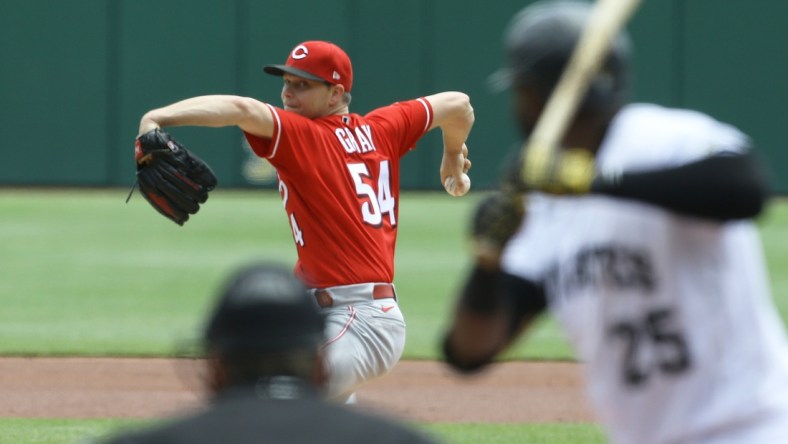 May 12, 2021; Pittsburgh, Pennsylvania, USA; Cincinnati Reds starting pitcher Sonny Gray (54) to Pittsburgh Pirates right fielder Gregory Polanco (25) during the first inning at PNC Park. Mandatory Credit: Charles LeClaire-USA TODAY Sports