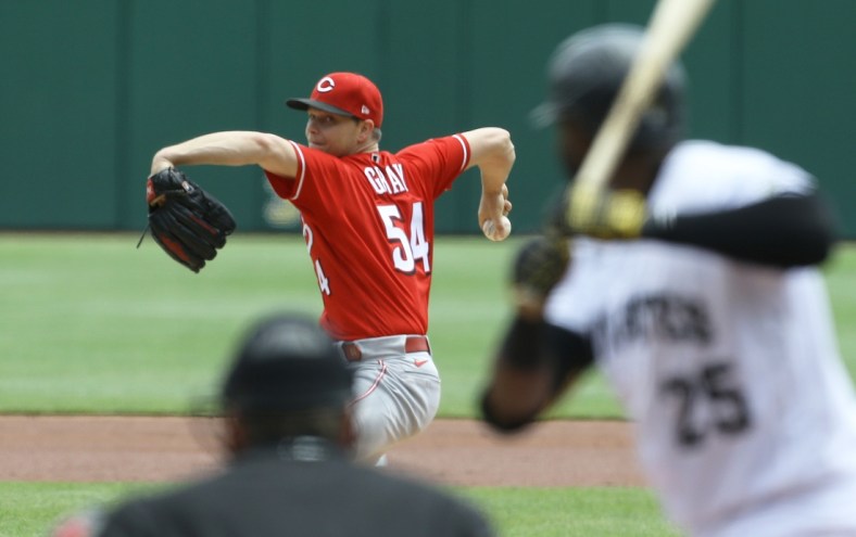 May 12, 2021; Pittsburgh, Pennsylvania, USA; Cincinnati Reds starting pitcher Sonny Gray (54) to Pittsburgh Pirates right fielder Gregory Polanco (25) during the first inning at PNC Park. Mandatory Credit: Charles LeClaire-USA TODAY Sports