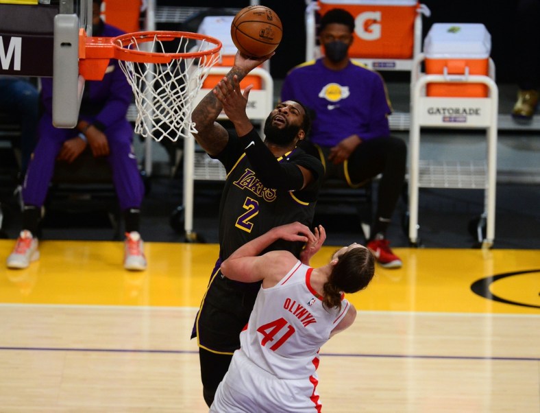 May 12, 2021; Los Angeles, California, USA; Los Angeles Lakers center Andre Drummond (2) shoots against Houston Rockets forward Kelly Olynyk (41) during the first half at Staples Center. Mandatory Credit: Gary A. Vasquez-USA TODAY Sports