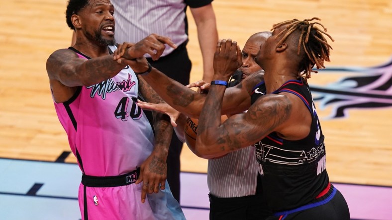 May 13, 2021; Miami, Florida, USA; Miami Heat forward Udonis Haslem (40) and Philadelphia 76ers center Dwight Howard (39) get into an altercation during the first half at American Airlines Arena. Mandatory Credit: Jasen Vinlove-USA TODAY Sports