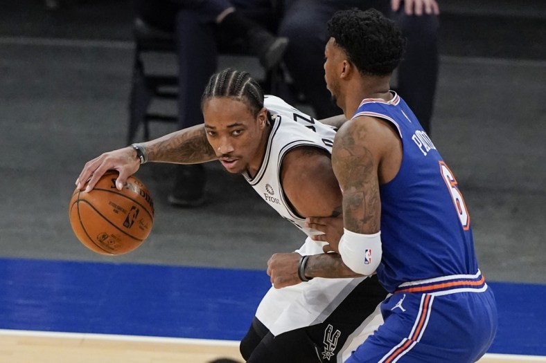 May 13, 2021; New York, New York, USA; New York Knicks' Elfrid Payton (6) defends San Antonio Spurs' DeMar DeRozan (L) during the first half at Madison Square Garden. Mandatory Credit: Frank Franklin II/POOL PHOTOS-USA TODAY Sports