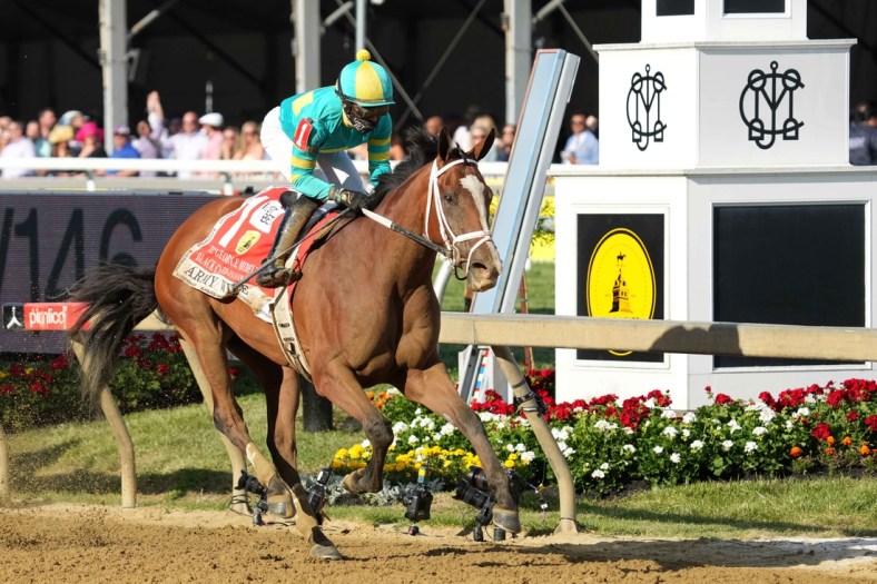 May 14, 2021; Baltimore, Maryland, USA; Army Wife with jockey Joel Rosario wins the Black-Eyed Susan Stakes at Pimlico Race Course. Mandatory Credit: Mitch Stringer-USA TODAY Sports