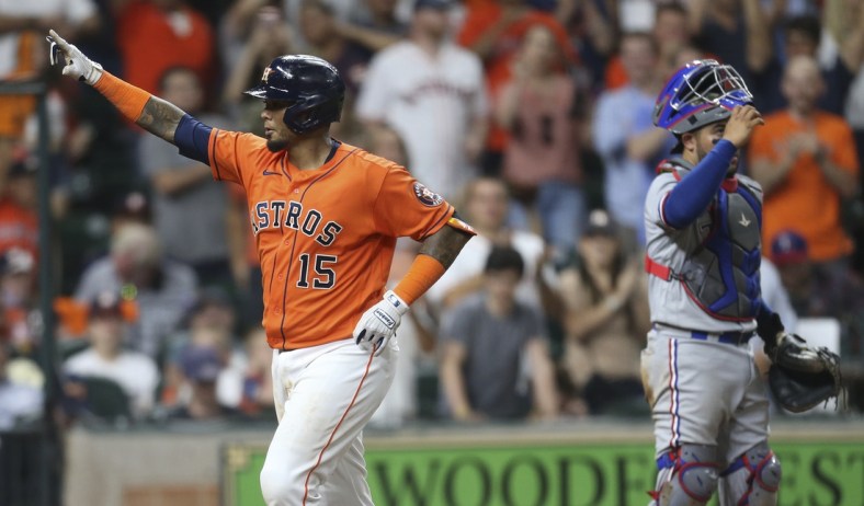May 14, 2021; Houston, Texas, USA;  Houston Astros catcher Martin Maldonado (15) celebrates as he rounds the bases after hitting a two run home run against the Texas Rangers in the fifth inning at Minute Maid Park. Mandatory Credit: Thomas Shea-USA TODAY Sports