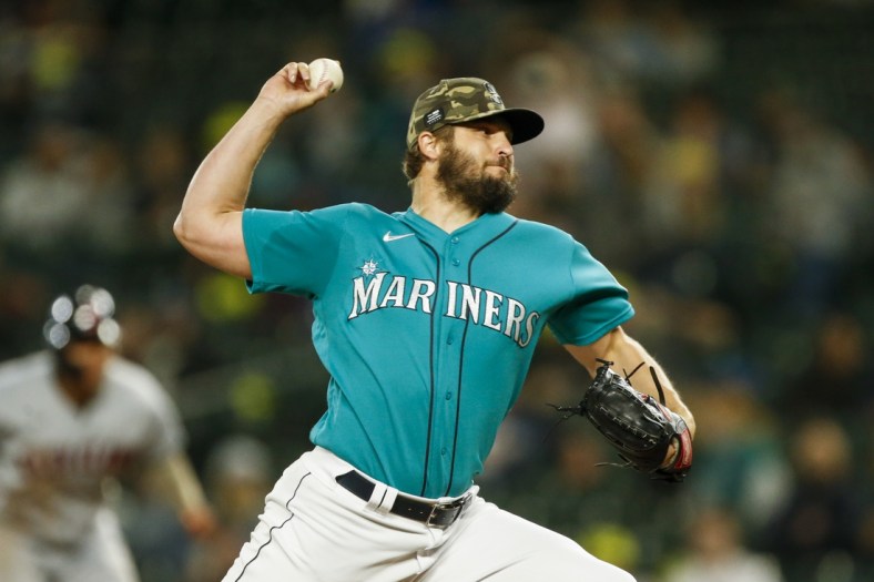 May 14, 2021; Seattle, Washington, USA; Seattle Mariners starting pitcher Kendall Graveman (49) throws against the Cleveland Indians during the seventh inning at T-Mobile Park. Mandatory Credit: Joe Nicholson-USA TODAY Sports
