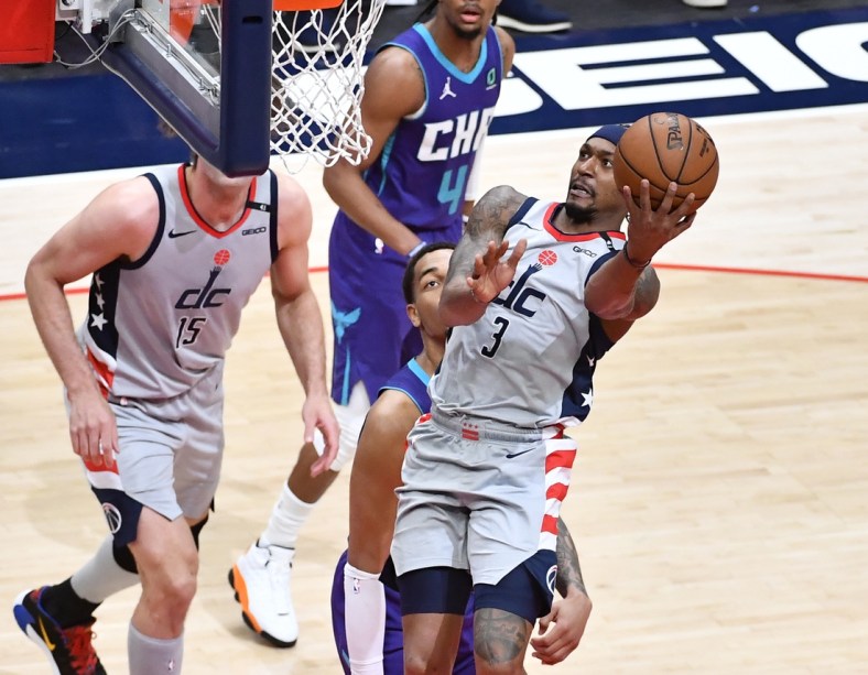 May 16, 2021; Washington, District of Columbia, USA; Washington Wizards guard Bradley Beal (3) shoots as Charlotte Hornets forward Miles Bridges (0) looks on during the second quarter at Capital One Arena. Mandatory Credit: Brad Mills-USA TODAY Sports