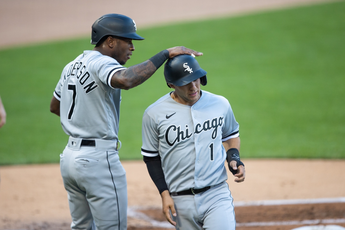 May 17, 2021; Minneapolis, Minnesota, USA; Chicago White Sox shortstop Tim Anderson (7) and second baseman Nick Madrigal (1) score during the first inning against the Minnesota Twins at Target Field. Mandatory Credit: Jordan Johnson-USA TODAY Sports