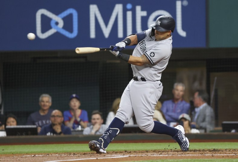 May 18, 2021; Arlington, Texas, USA; New York Yankees second baseman Rougned Odor (18) singles during the second inning against the Texas Rangers at Globe Life Field. Mandatory Credit: Kevin Jairaj-USA TODAY Sports