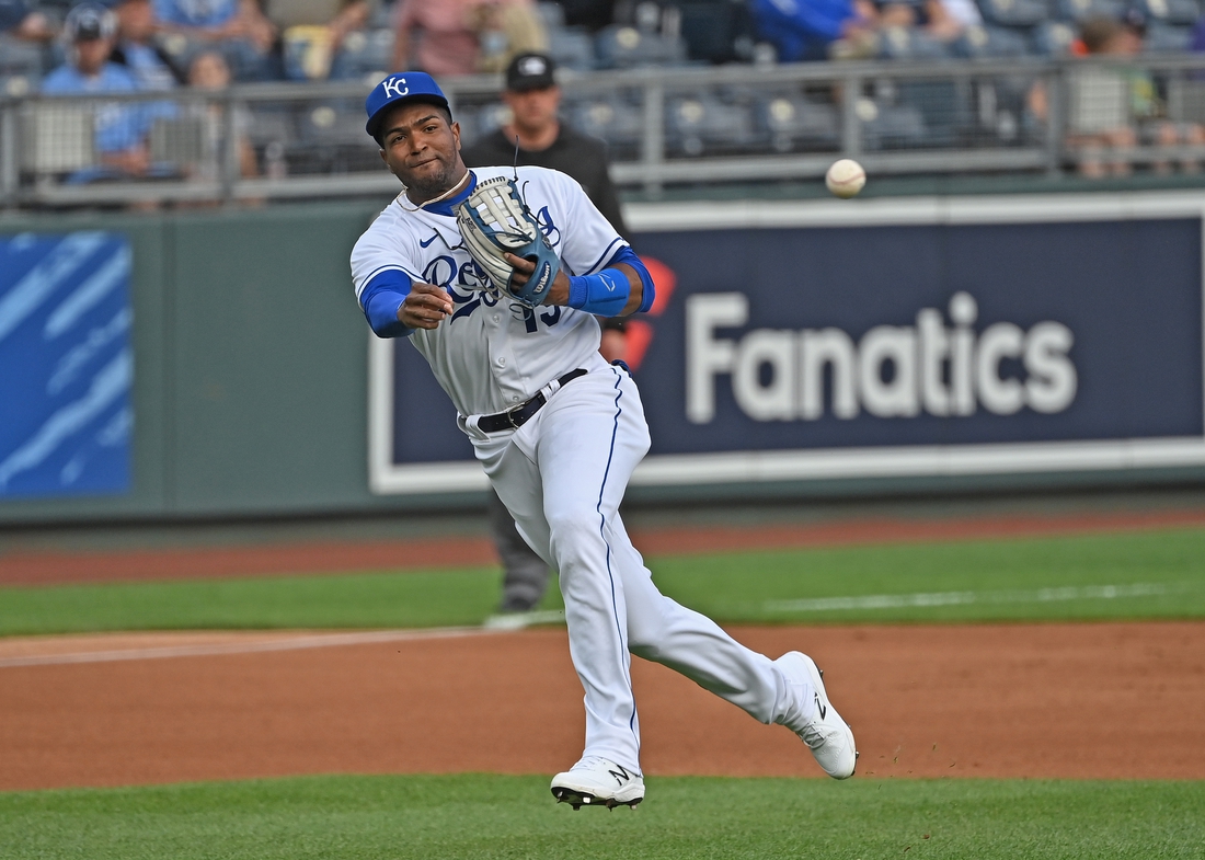 May 18, 2021; Kansas City, Missouri, USA; Kansas City Royals third baseman Kelvin Gutierrez (19) makes a throw to first for an out during the first inning against the Milwaukee Brewers at Kauffman Stadium. Mandatory Credit: Peter Aiken-USA TODAY Sports