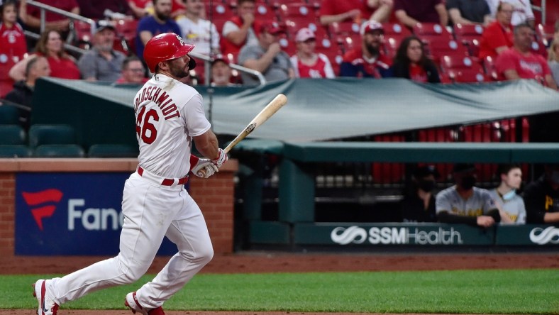 May 19, 2021; St. Louis, Missouri, USA;  St. Louis Cardinals first baseman Paul Goldschmidt (46) hits a one run single during the second inning against the Pittsburgh Pirates at Busch Stadium. Mandatory Credit: Jeff Curry-USA TODAY Sports