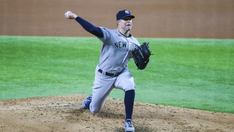 May 19, 2021; Arlington, Texas, USA; New York Yankees starting pitcher Corey Kluber (28) throws during the fourth inning against the Texas Rangers at Globe Life Field. Mandatory Credit: Kevin Jairaj-USA TODAY Sports