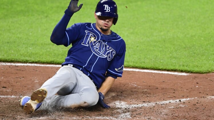 May 19, 2021; Baltimore, Maryland, USA;  Tampa Bay Rays shortstop Willy Adames (1) scores during the eighth inning against the Baltimore Orioles at Oriole Park at Camden Yards. Mandatory Credit: Tommy Gilligan-USA TODAY Sports