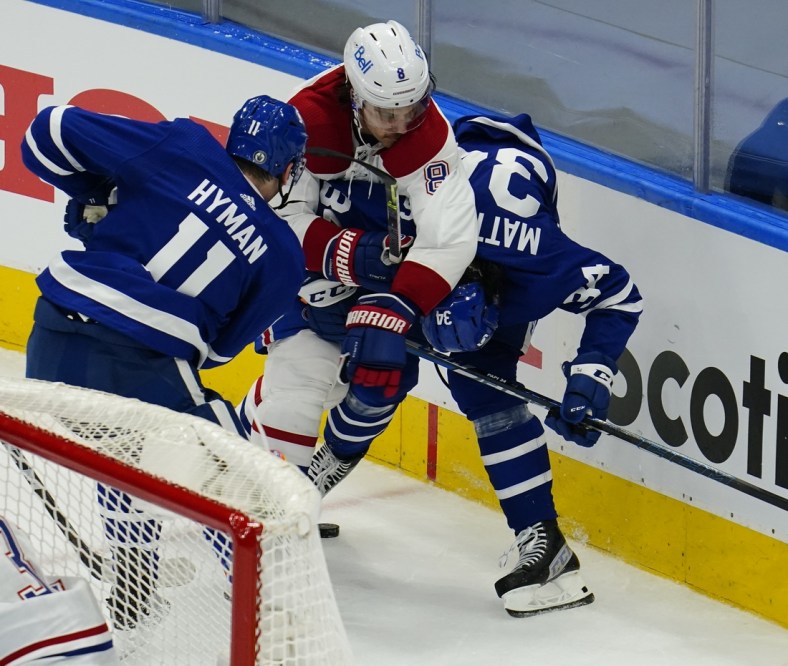 May 20, 2021; Toronto, Ontario, CAN; Montreal Canadiens defenseman Ben Chiarot (8) roughs up Toronto Maple Leafs forward Auston Matthews (34) during the second period of game one of the first round of the 2021 Stanley Cup Playoffs at Scotiabank Arena. Mandatory Credit: John E. Sokolowski-USA TODAY Sports