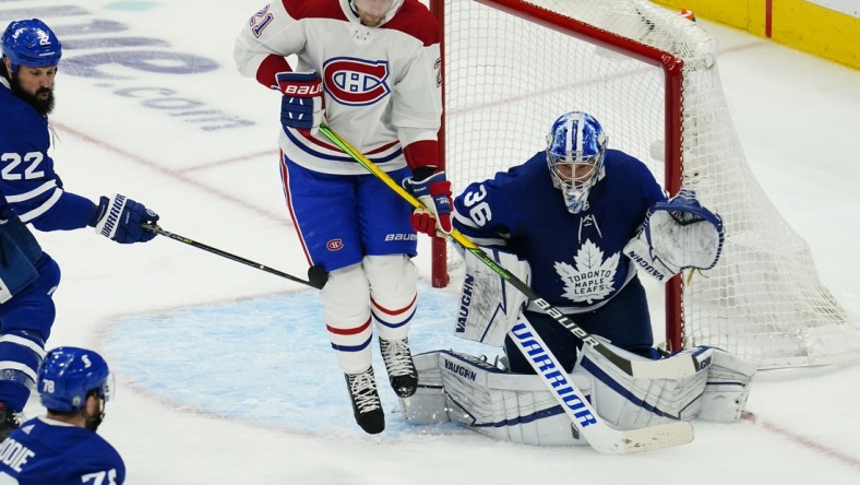 May 20, 2021; Toronto, Ontario, CAN; Montreal Canadiens forward Eric Staal (21) tries to get out of the way of a shot on Toronto Maple Leafs goaltender Jack Campbell (36) during the third period of game one of the first round of the 2021 Stanley Cup Playoffs at Scotiabank Arena. Mandatory Credit: John E. Sokolowski-USA TODAY Sports