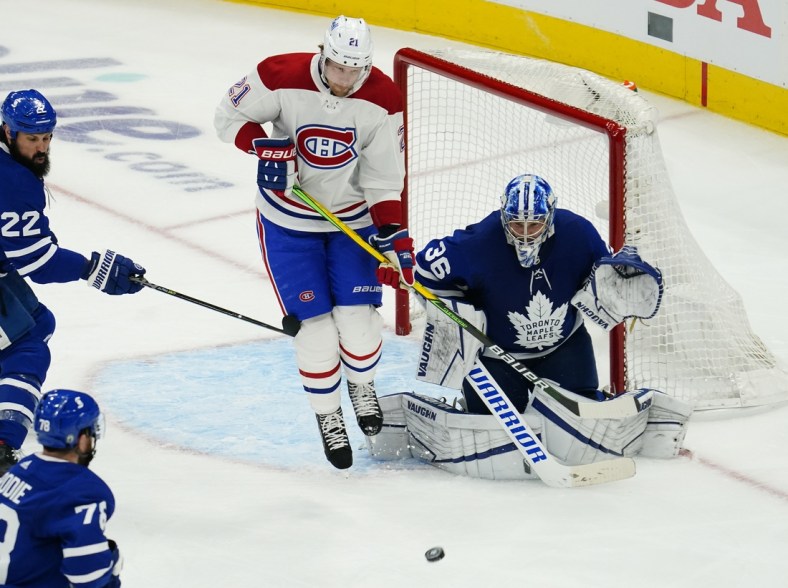 May 20, 2021; Toronto, Ontario, CAN; Montreal Canadiens forward Eric Staal (21) tries to get out of the way of a shot on Toronto Maple Leafs goaltender Jack Campbell (36) during the third period of game one of the first round of the 2021 Stanley Cup Playoffs at Scotiabank Arena. Mandatory Credit: John E. Sokolowski-USA TODAY Sports